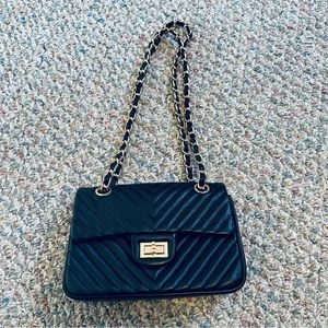 Leather mini chain purse.